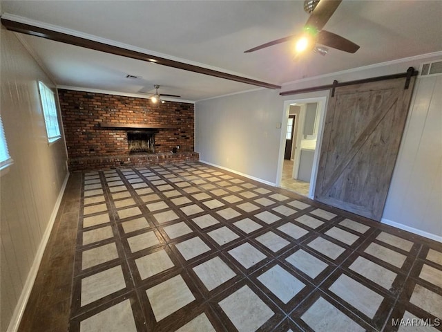 unfurnished living room featuring visible vents, baseboards, a ceiling fan, and a brick fireplace