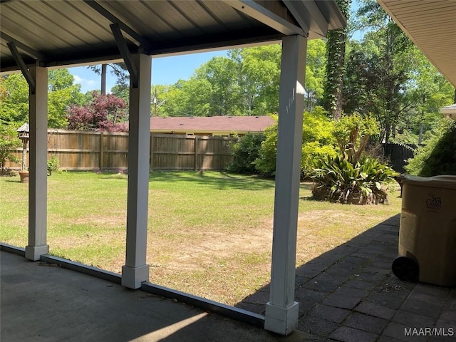 view of yard featuring fence and a patio area