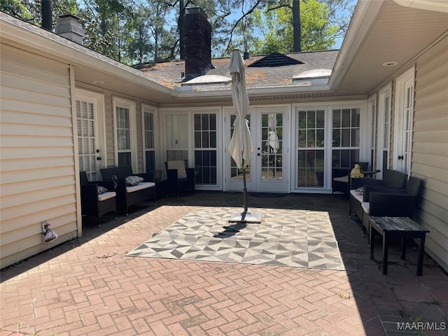 view of patio / terrace featuring outdoor lounge area and french doors