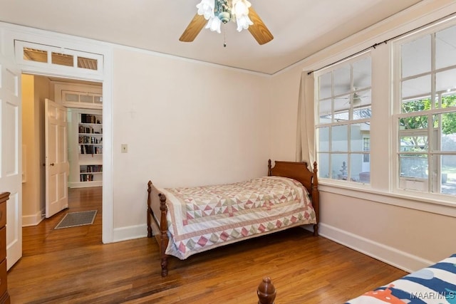 374 Rose Ln, Montgomery, AL 36104 - bedroom with wood finished floors, visible vents, baseboards, and ceiling fan