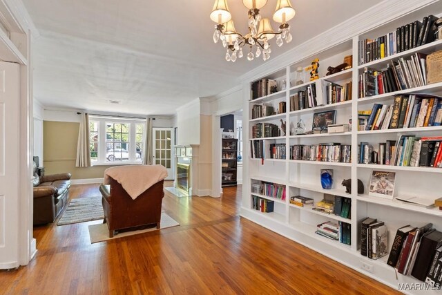 374 Rose Ln, Montgomery, AL 36104 - interior space featuring crown molding, a chandelier, and wood finished floors