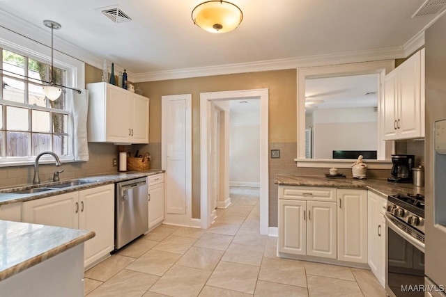 374 Rose Ln, Montgomery, AL 36104 - kitchen with white cabinets, stainless steel appliances, visible vents, and a sink