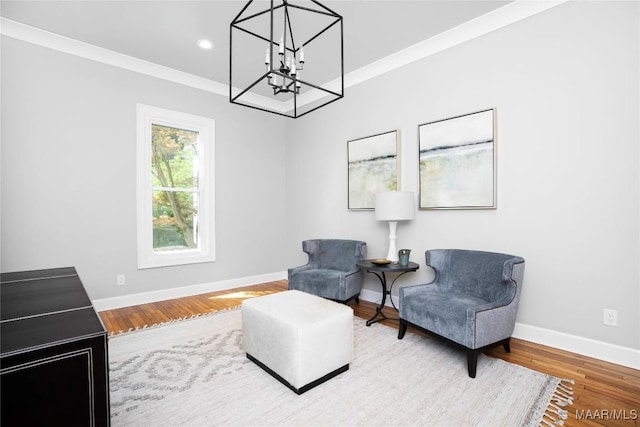 6432 Wynwood Pl, Montgomery, AL 36117 - living area with baseboards, a chandelier, wood finished floors, recessed lighting, and crown molding