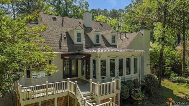 6432 Wynwood Pl, Montgomery, AL 36117 - back of house featuring a chimney, roof with shingles, a standing seam roof, stairs, and a deck