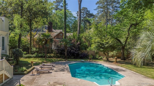 6432 Wynwood Pl, Montgomery, AL 36117 - view of swimming pool with a patio area and view of wooded area