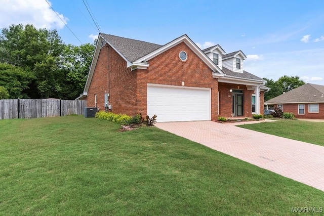 view of front facade featuring brick siding, cooling unit, decorative driveway, a garage, and a shingled roof