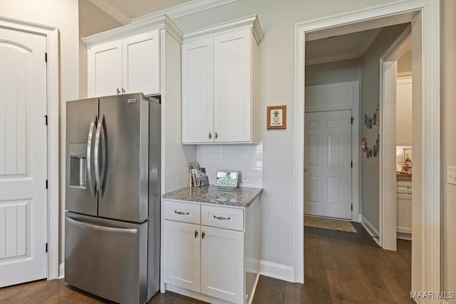 184 Houston St, Prattville, AL 36066 - kitchen with white cabinets, light stone counters, dark wood-type flooring, and stainless steel fridge