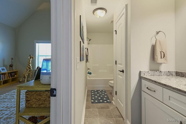 184 Houston St, Prattville, AL 36066 - full bathroom with vaulted ceiling, toilet, vanity, baseboards, and visible vents