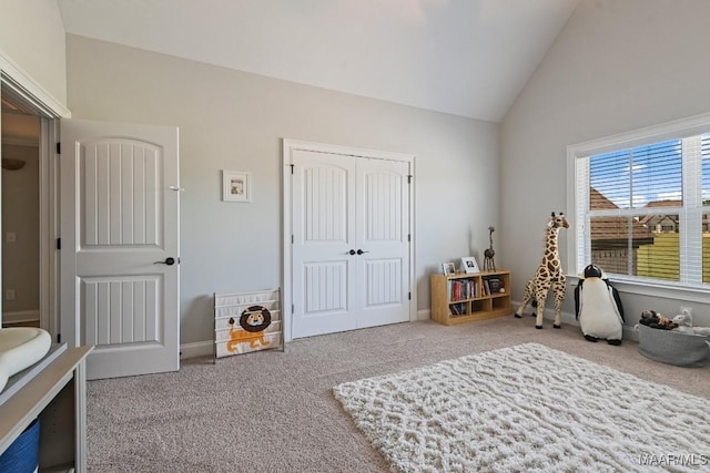 184 Houston St, Prattville, AL 36066 - bedroom featuring baseboards, carpet floors, a closet, and high vaulted ceiling