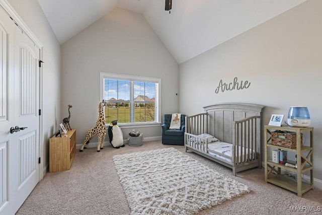184 Houston St, Prattville, AL 36066 - carpeted bedroom featuring high vaulted ceiling, a nursery area, baseboards, and a ceiling fan