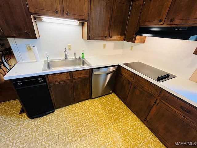 kitchen with black electric stovetop, dishwasher, light countertops, and a sink
