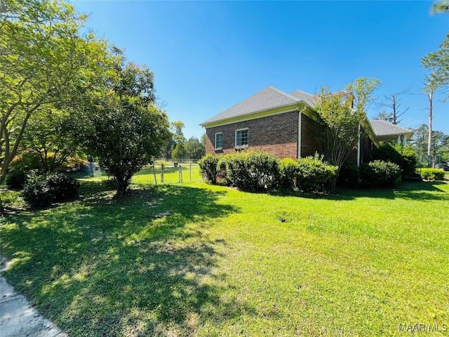 view of yard with fence