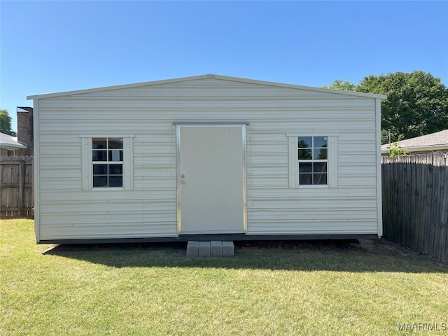 view of shed featuring a fenced backyard