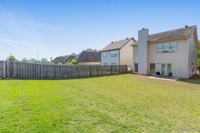 view of yard featuring a fenced backyard and a patio
