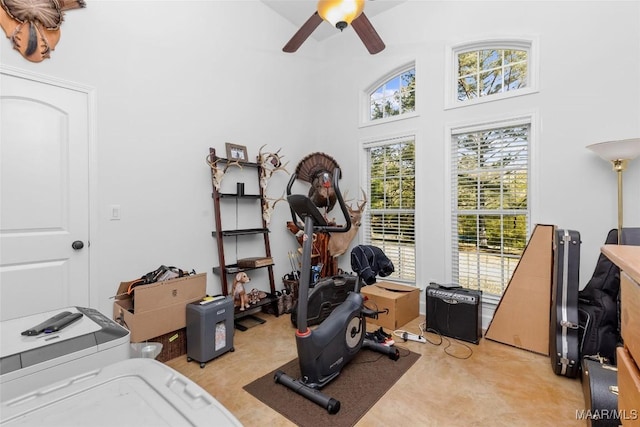 workout area with a ceiling fan