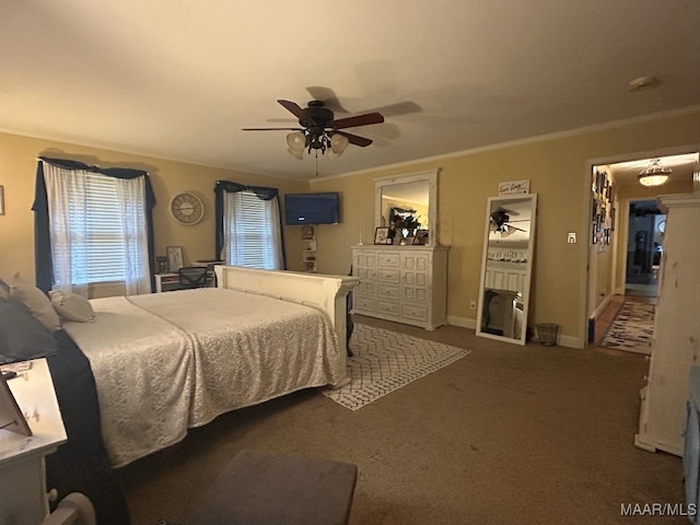 bedroom with baseboards, carpet flooring, a ceiling fan, and ornamental molding