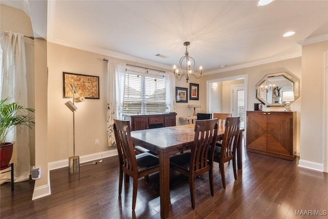 dining area featuring a chandelier, dark wood finished floors, baseboards, visible vents, and recessed lighting
