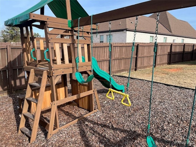 view of playground with a fenced backyard