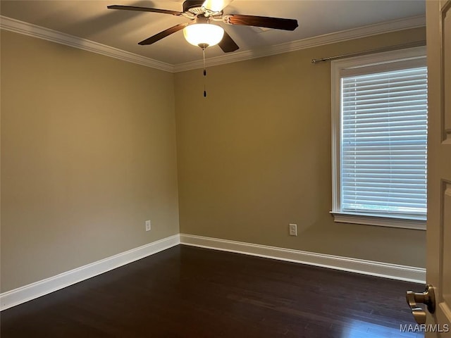 unfurnished room with ornamental molding, baseboards, and dark wood-style flooring