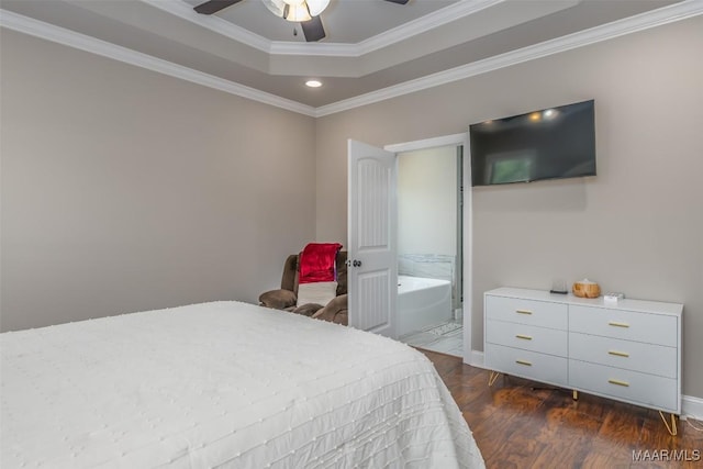 1017 Ridge Point Dr, Deatsville, AL 36022 - bedroom featuring recessed lighting, dark wood-style floors, a tray ceiling, crown molding, and baseboards