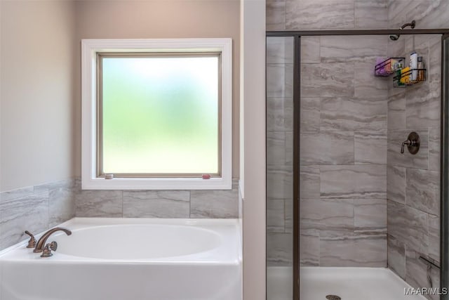 1017 Ridge Point Dr, Deatsville, AL 36022 - full bathroom featuring a bath and a stall shower