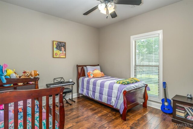 1017 Ridge Point Dr, Deatsville, AL 36022 - bedroom featuring baseboards, a ceiling fan, and wood finished floors