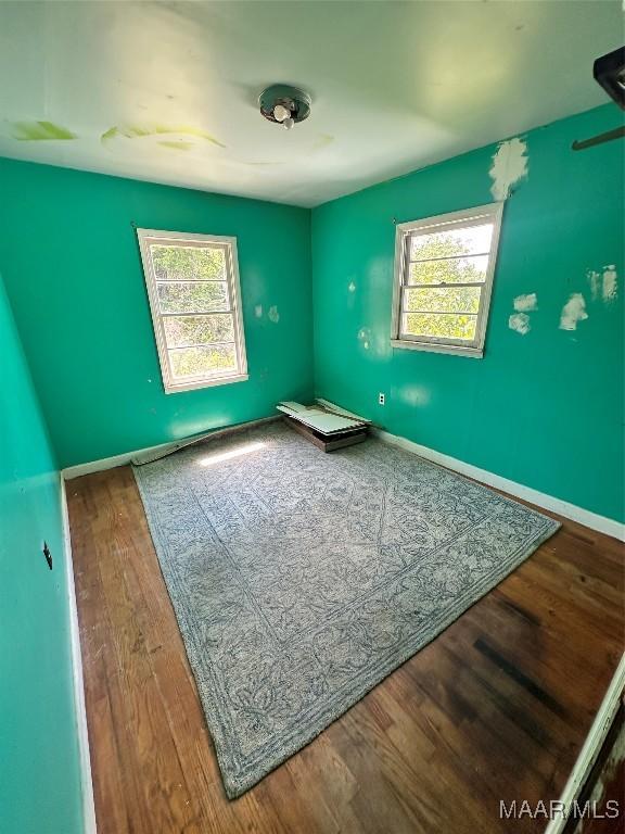 158 County Road 852nd Rd, Selma, AL 36701 - unfurnished room featuring baseboards and wood finished floors