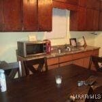 kitchen with stainless steel microwave
