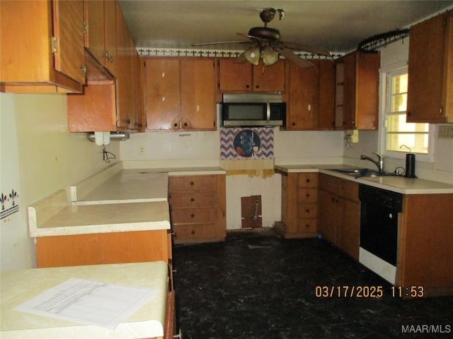 kitchen with stainless steel microwave, a sink, brown cabinets, ceiling fan, and dishwasher