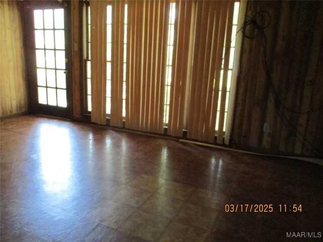 unfurnished room with a wealth of natural light