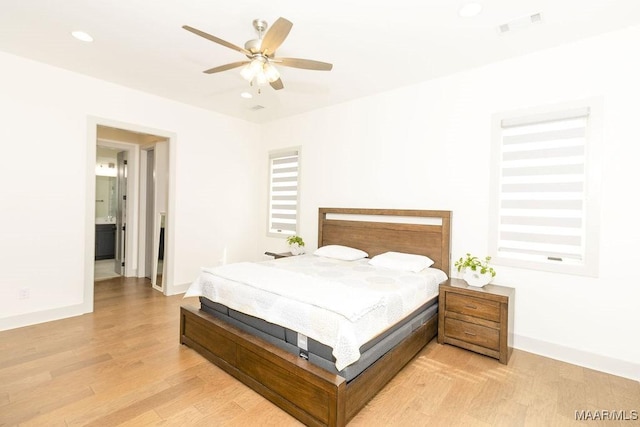 bedroom with recessed lighting, light wood-style flooring, baseboards, visible vents, and a ceiling fan