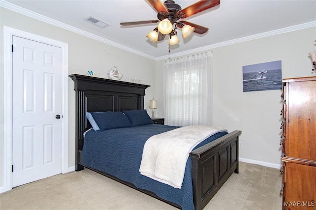 bedroom with light colored carpet, ornamental molding, baseboards, visible vents, and a ceiling fan