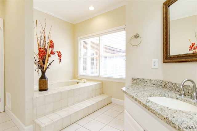 bathroom with vanity, a bath, tile patterned floors, baseboards, and ornamental molding