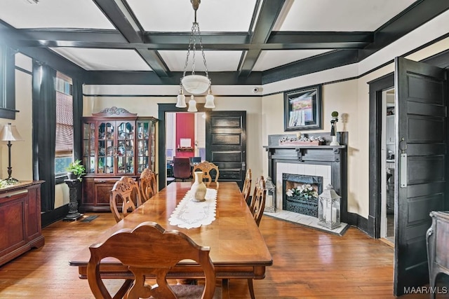 48 S Capitol Pkwy, Montgomery, AL 36107 - dining space featuring hardwood / wood-style floors, coffered ceiling, and a fireplace