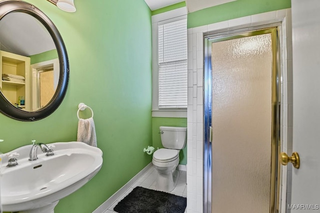 48 S Capitol Pkwy, Montgomery, AL 36107 - full bath with tile patterned floors, toilet, a stall shower, and a sink