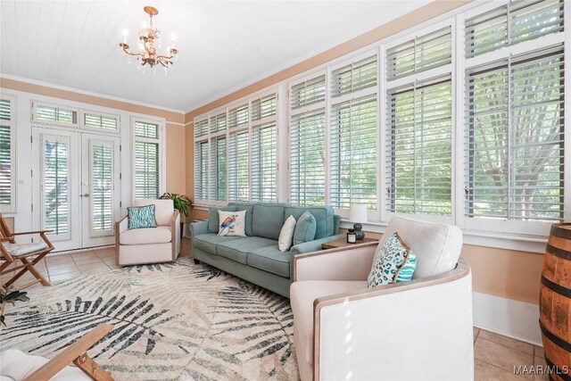 100 S Franklin Ave, Luverne, AL 36049 - sunroom with french doors, plenty of natural light, and a chandelier