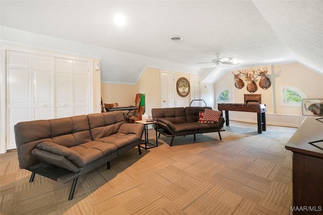 100 S Franklin Ave, Luverne, AL 36049 - living area featuring visible vents, ceiling fan, lofted ceiling, and light colored carpet