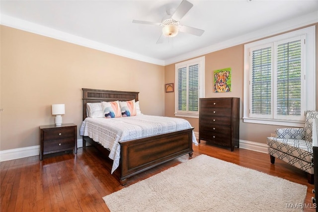 100 S Franklin Ave, Luverne, AL 36049 - bedroom with baseboards, a ceiling fan, and dark wood finished floors