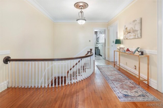 100 S Franklin Ave, Luverne, AL 36049 - corridor with wood-type flooring, ornamental molding, and an upstairs landing