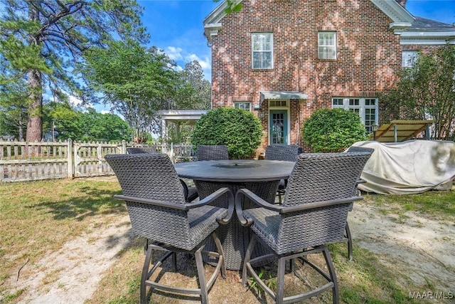 100 S Franklin Ave, Luverne, AL 36049 - view of patio / terrace with fence and outdoor dining space