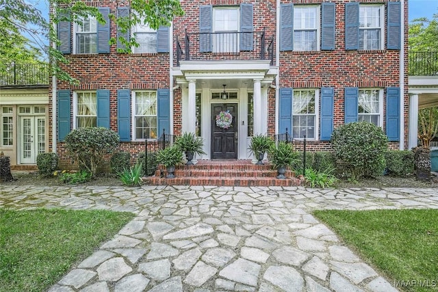 100 S Franklin Ave, Luverne, AL 36049 - doorway to property featuring brick siding