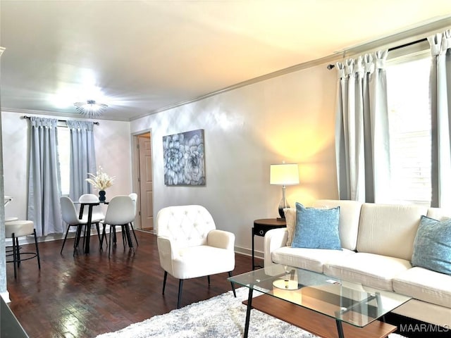644 Iris Ln, Montgomery, AL 36105 - living area with crown molding, wood finished floors, and baseboards