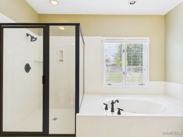 full bath with a garden tub, a stall shower, and recessed lighting