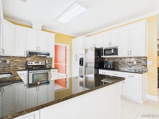 kitchen with exhaust hood, decorative backsplash, appliances with stainless steel finishes, white cabinets, and crown molding