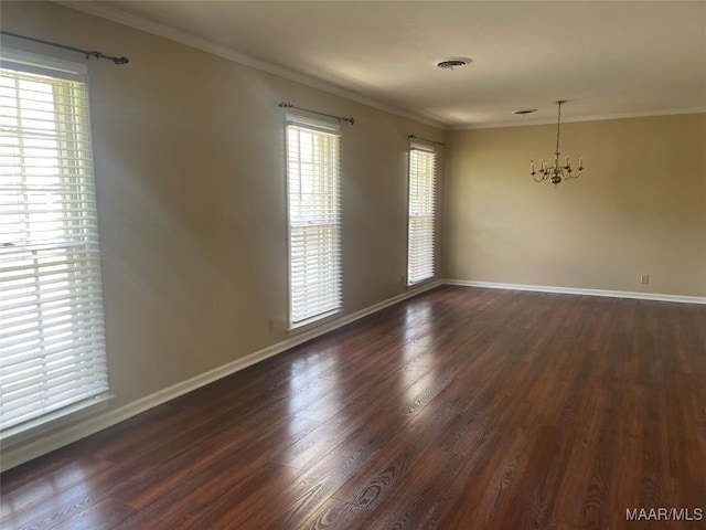 3244 Cheltenham Dr, Montgomery, AL 36116 - unfurnished room featuring ornamental molding, an inviting chandelier, dark wood-style flooring, and visible vents