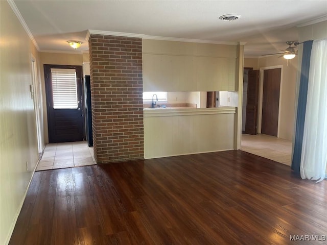 3244 Cheltenham Dr, Montgomery, AL 36116 - unfurnished room with crown molding, light wood-style flooring, a sink, visible vents, and ceiling fan