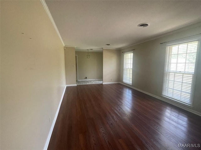 3244 Cheltenham Dr, Montgomery, AL 36116 - unfurnished room featuring visible vents, crown molding, dark wood finished floors, and baseboards
