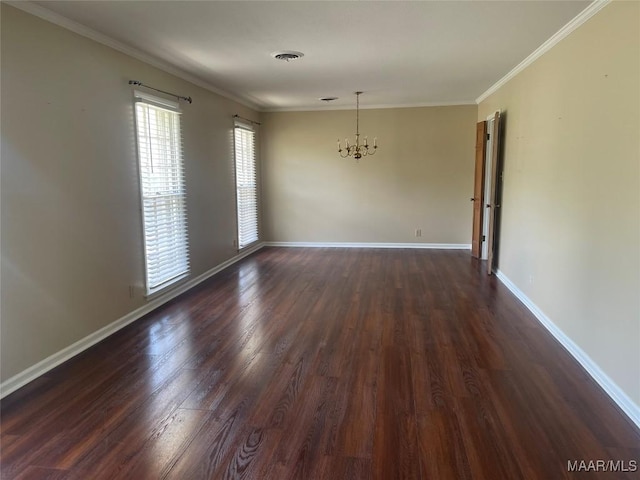 3244 Cheltenham Dr, Montgomery, AL 36116 - empty room featuring visible vents, baseboards, ornamental molding, dark wood finished floors, and a notable chandelier