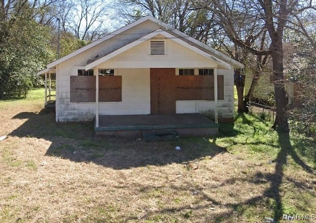 exterior space with a front yard