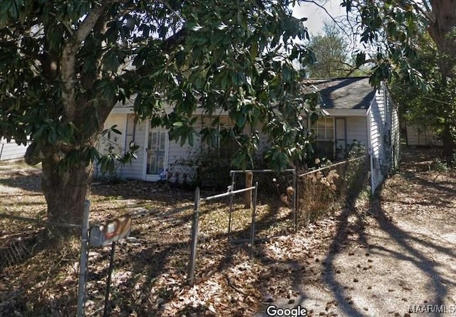 exterior space featuring fence